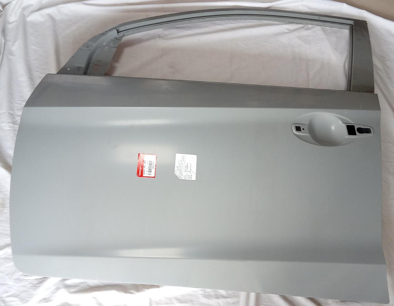 CarTrends Amaze front left door kit, spare part for vehicle, showing the exterior panel with handle and hinge area.