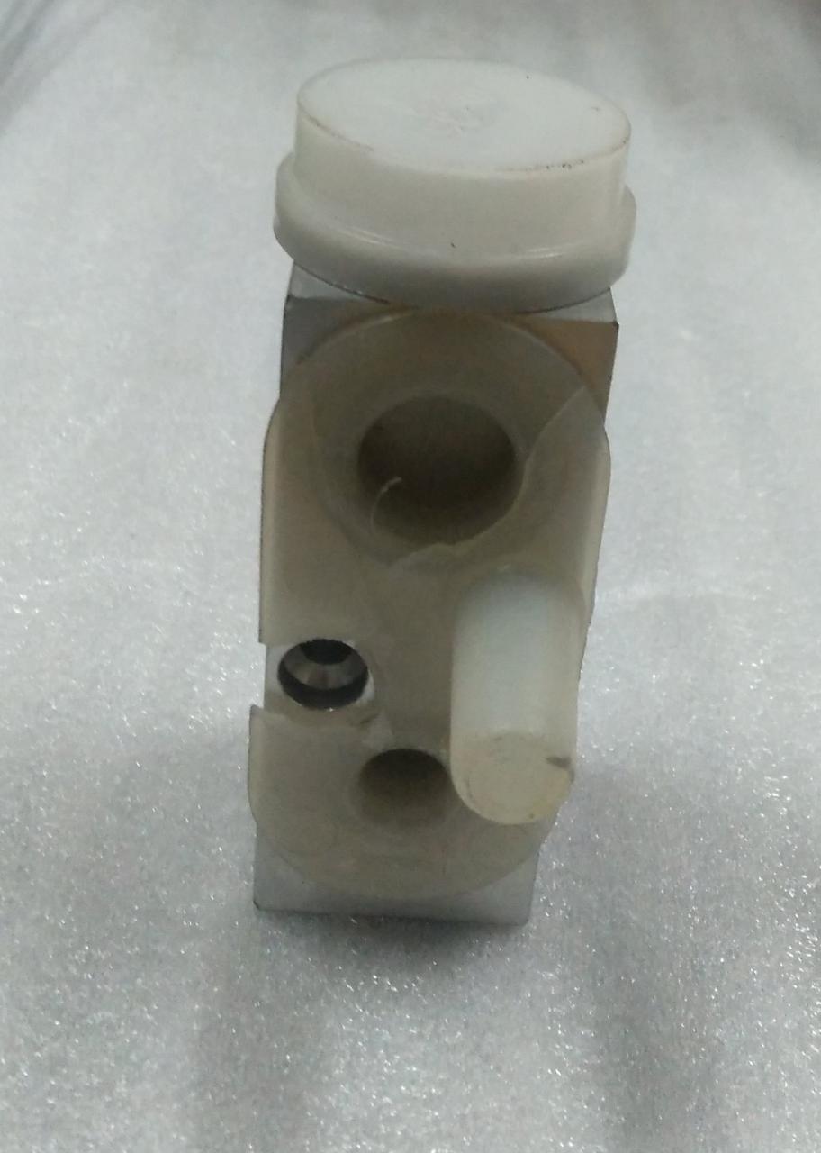 CarTrends Expansion Valve Spark spare part, with metal and plastic components, for automotive cooling systems.
