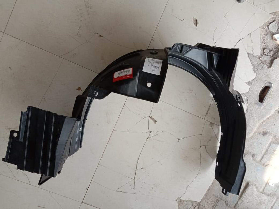 CarTrends Fender Lining Amaze 2018 onward left spare part, close-up of black plastic fender liner for Honda Amaze.