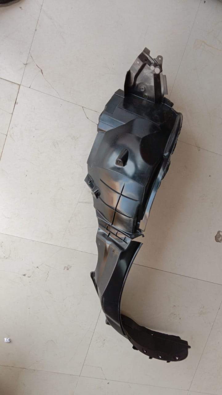 CarTrends Fender lining for Ertiga right side, spare part with part number 72321M58R10, shown as a close-up of the vehicle interior.