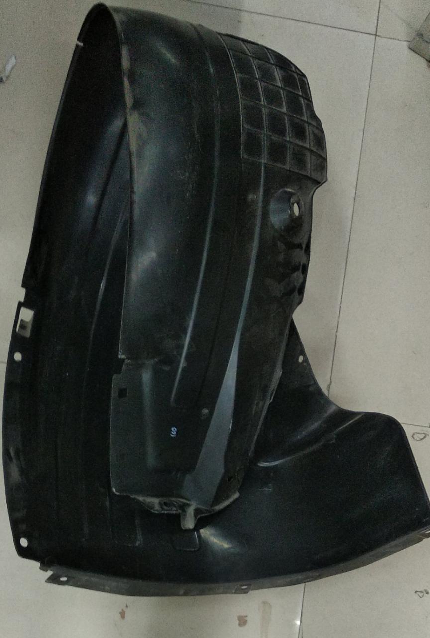 CarTrends Verna Next Gen left fender lining spare part with part number 86811H6000, shown attached to vehicle wheel well.