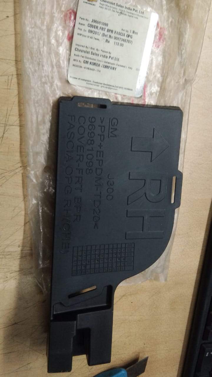 CarTrends front bumper cover for Chevrolet Cruze, spare car part, shown in natural black color with mounting details visible.