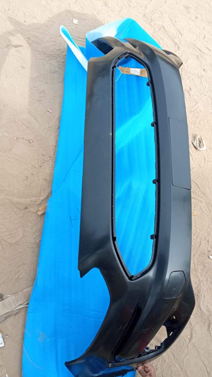 CarTrends front bumper freestyle spare part for vehicle, shown in black with mounting points and design details.