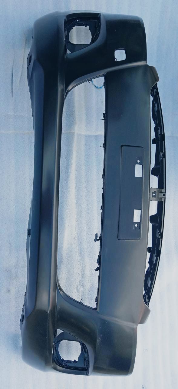 Front bumper for Maruti Suzuki Swift Dzire 2014 model by CarTrends, showing the car’s front bumper assembly and design.