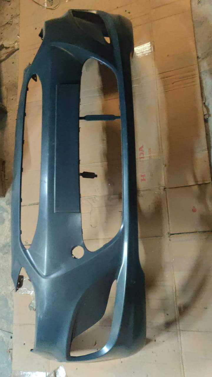 CarTrends front bumper for Verna Fluidic model, spare parts, durable automotive bumper with detailed design visible.