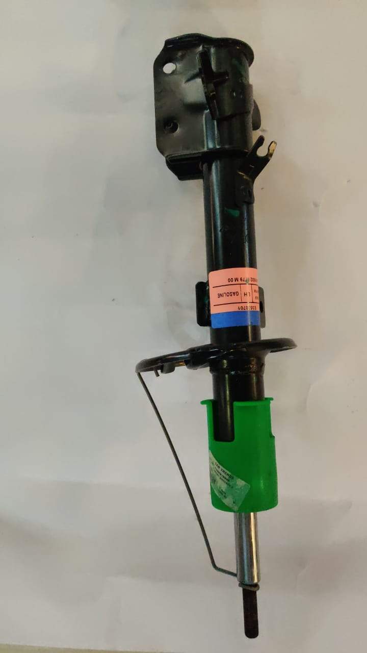 Front left shock absorber for Maruti Ciaz by CarTrends, shown in the image. Durable spare part for vehicle suspension.