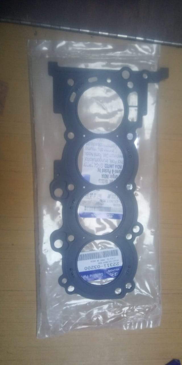 CarTrends cylinder head gasket for I10, spare part showing the gasket component for engine sealing on old model.
