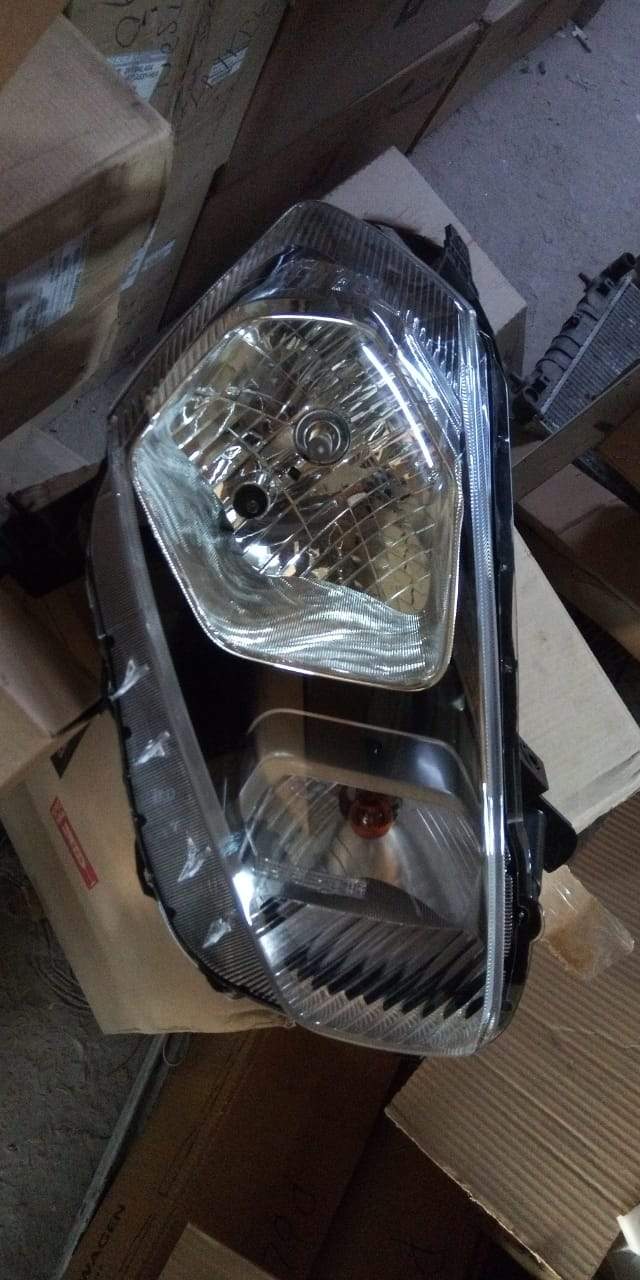 CarTrends Datsun Go right headlamp assembly, spare parts for vehicle lighting, showing the headlamp with mounting details.