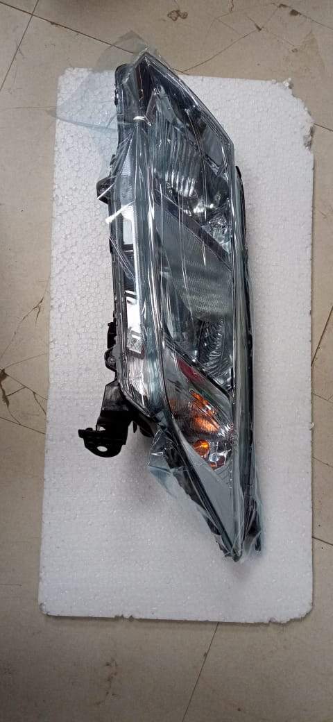 CarTrends head lamp for Honda City 7 left side, replacement spare part with clear lens and mounting details.