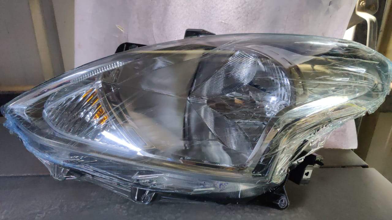 CarTrends head lamp assembly for Nissan Sunny, new model, left side, spare parts, clear image showing the headlight unit.