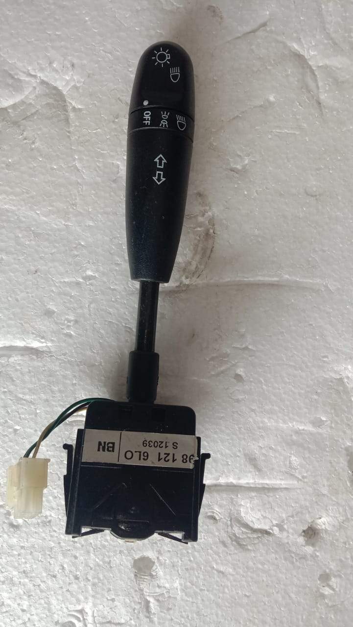 CarTrends headlamp switch spare part for Swift, Baleno, Brezza, and Ertiga models, shown in a close-up image.