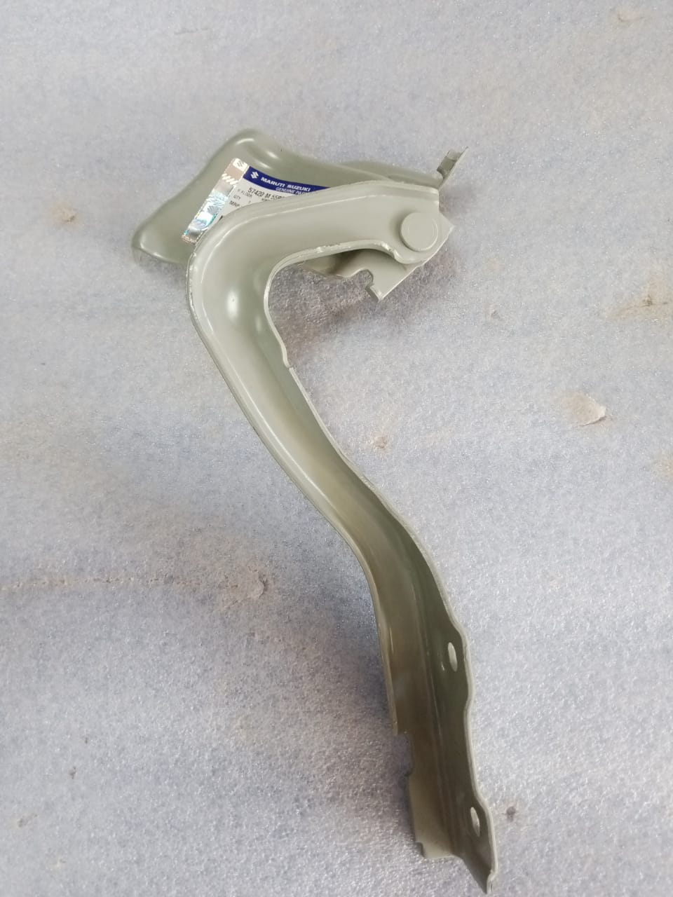 Front left hinge hood spare part for Suzuki Swift by CarTrends, showing the metal hinge component with mounting points.