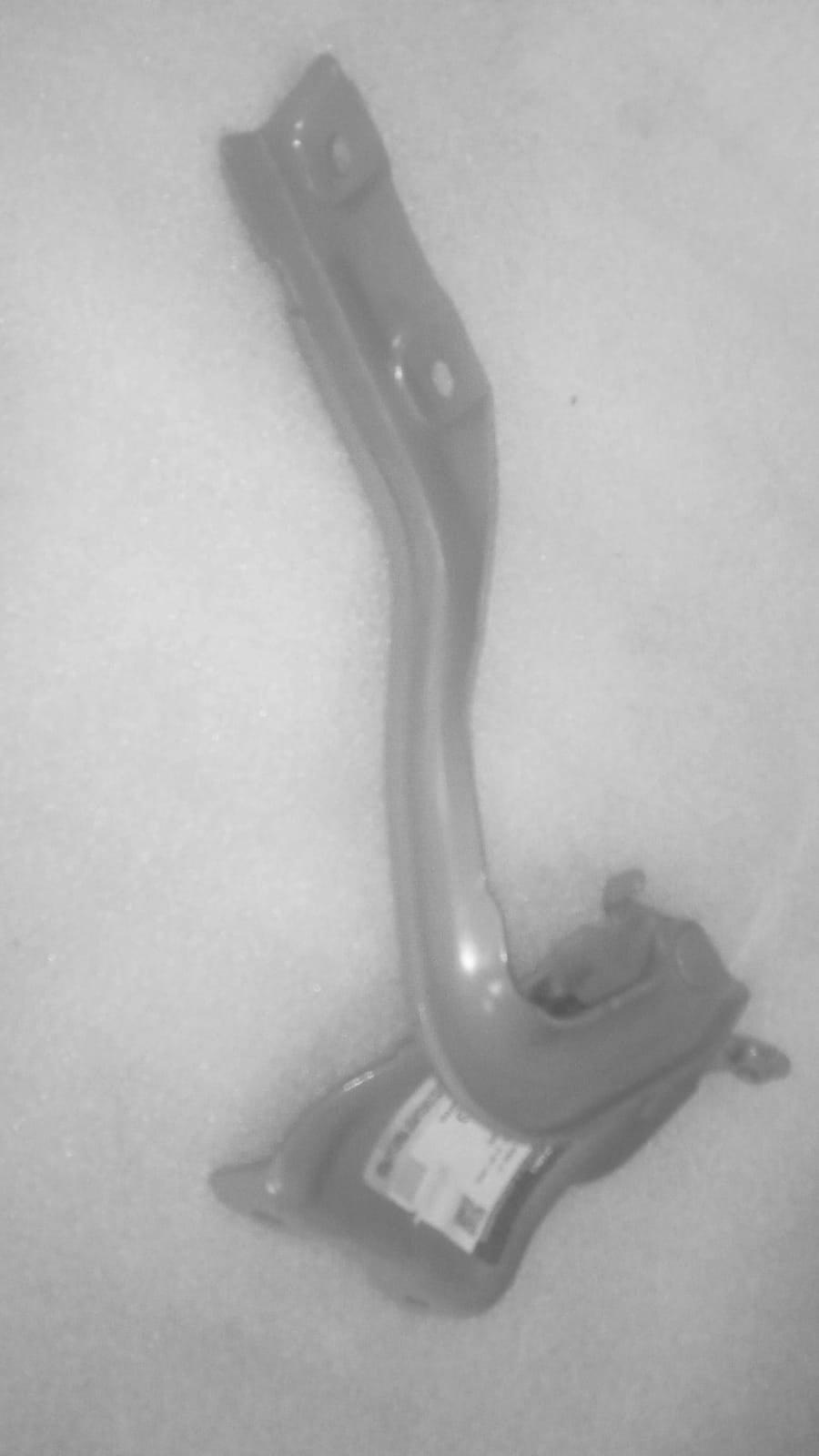 Suzuki Swift front right hood hinge spare part by CarTrends, showing the metal hinge component for vehicle repair.