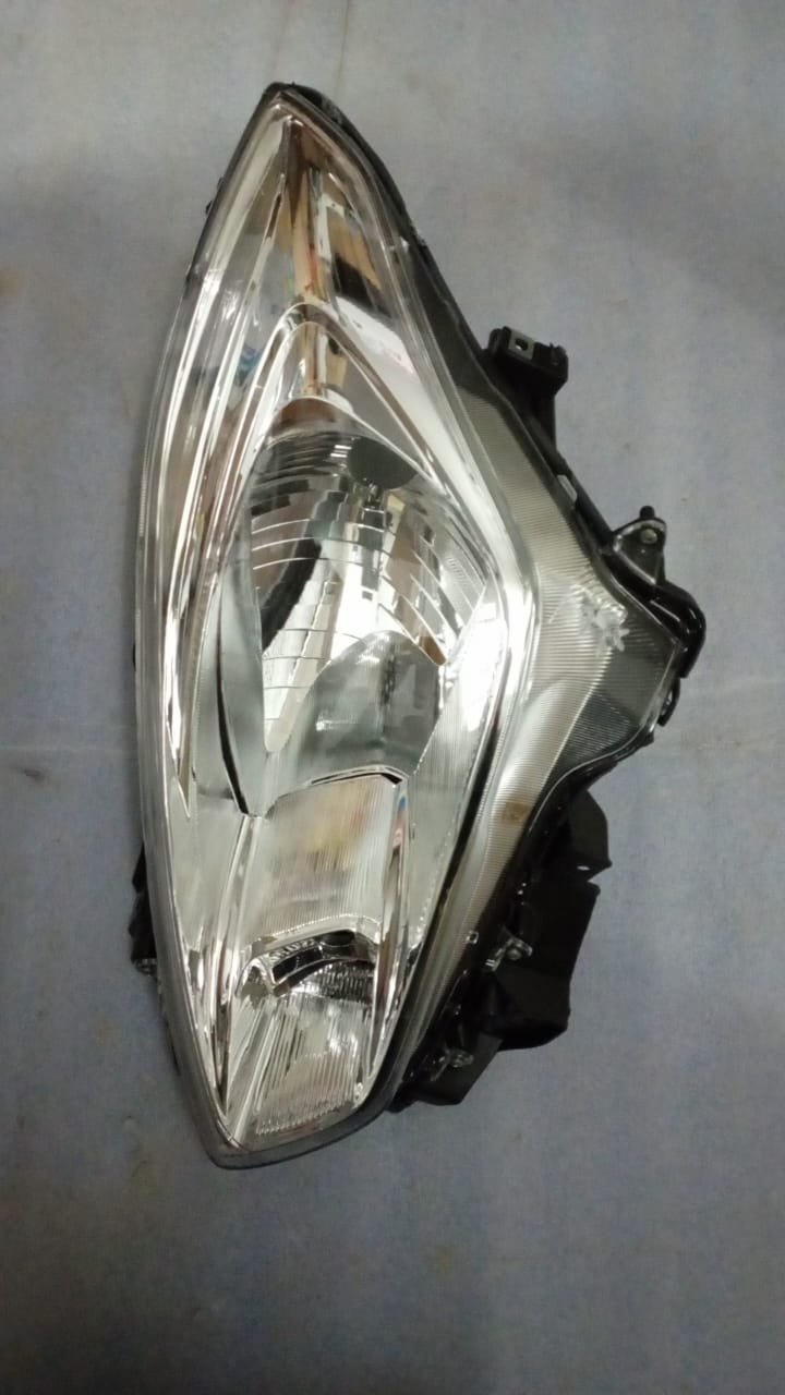CarTrends headlamp assembly for Suzuki Swift, Baleno, Alto, WagonR left side spare part, model HL57002M.