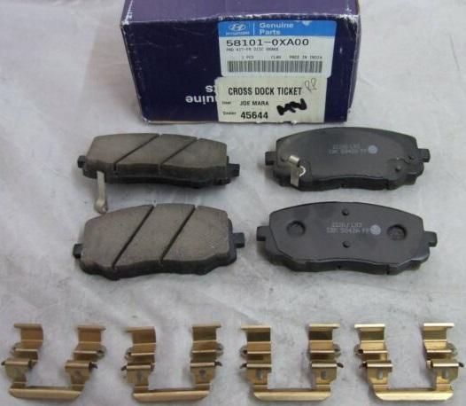 Hyundai i10 brake pad from CarTrends, auto spare part, close-up view showing new brake pad for vehicle maintenance.