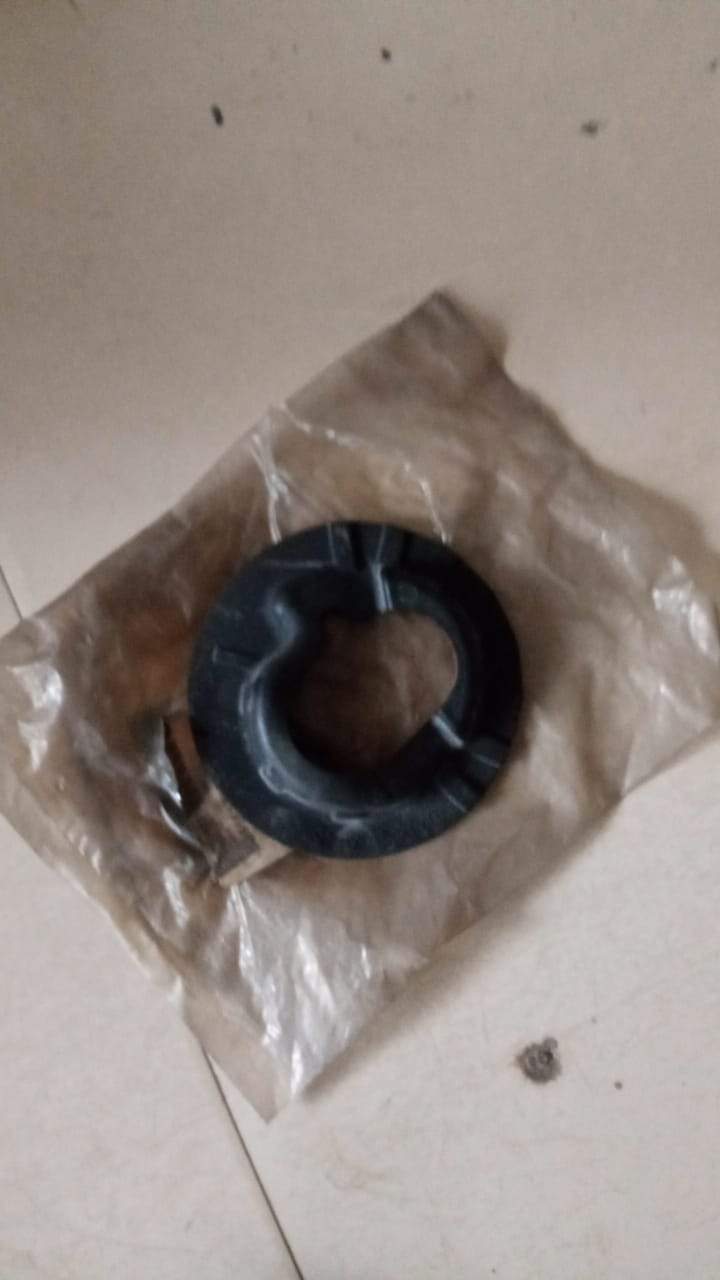CarTrends insulation spring for Optra 1.6 engine, spare part showing a metal coil spring component.