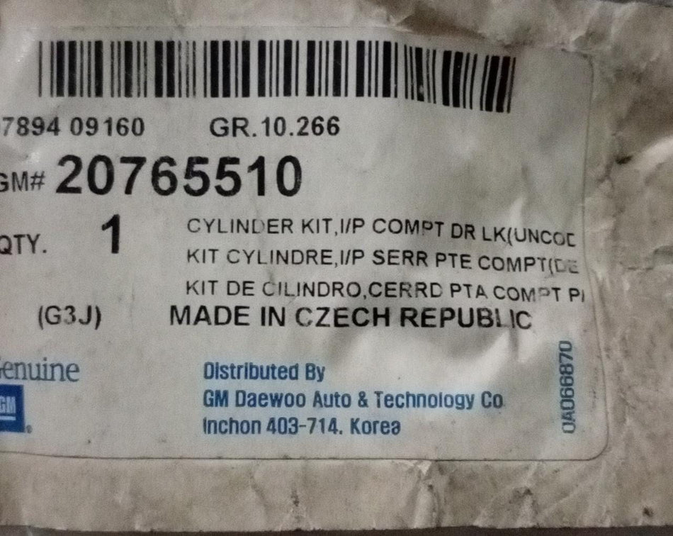 CarTrends IP compartment door lock for Cruze, spare part with key mechanism, shown in black with mounting hardware.