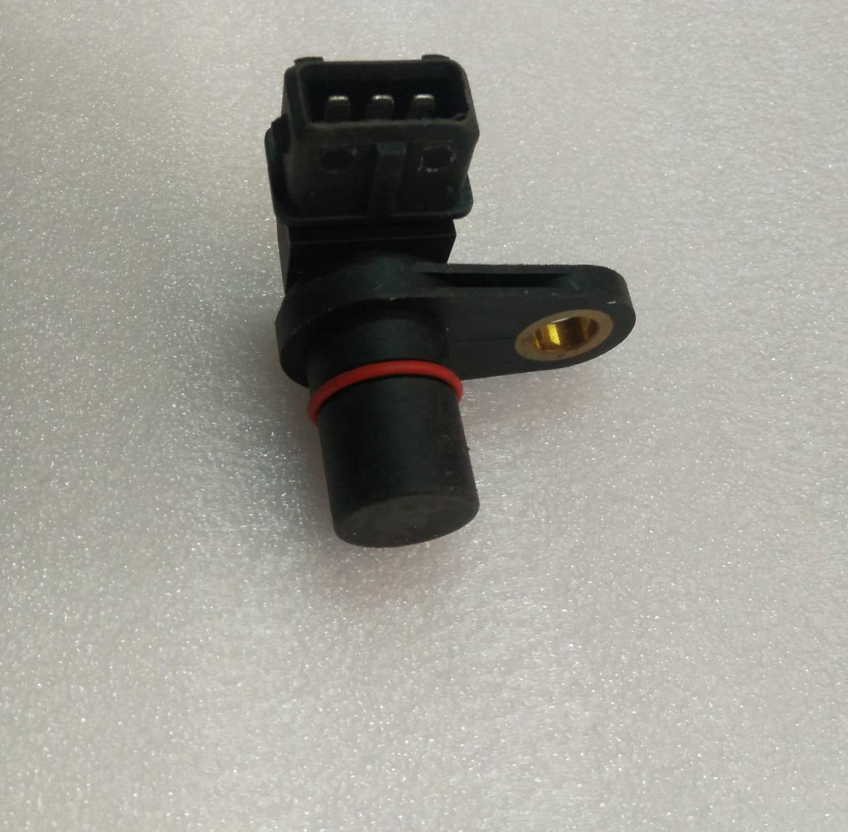 CarTrends camshaft position sensor for Chevrolet Beat, automotive spare part showing sensor component for engine performance.