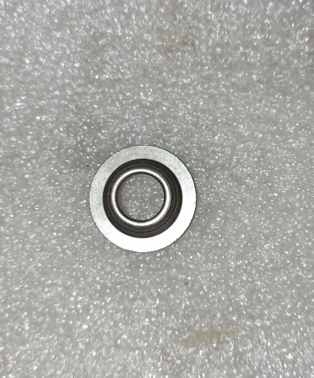 CarTrends retainer valve beat, spare part for automotive repair, close-up view showing details of the valve component