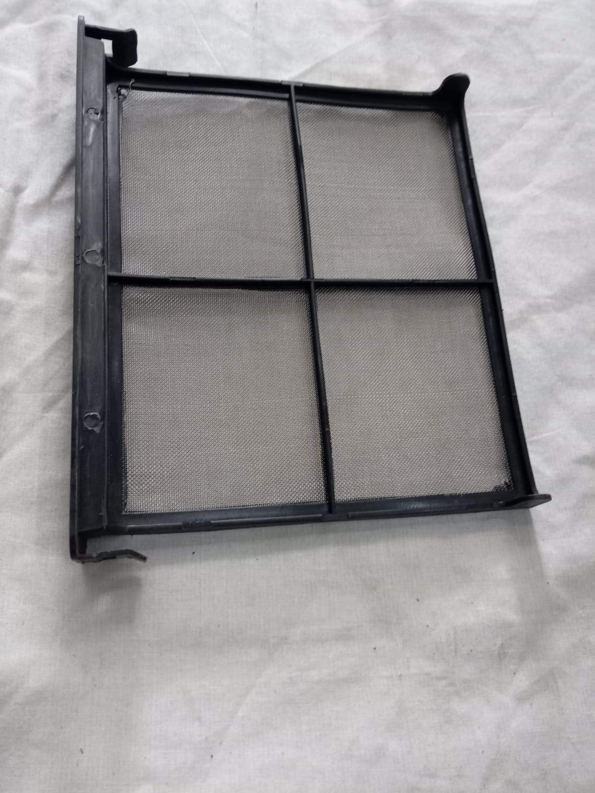 CarTrends Chevrolet Sail air filter, spare part for petrol engine, close-up view of the replacement automotive filter.