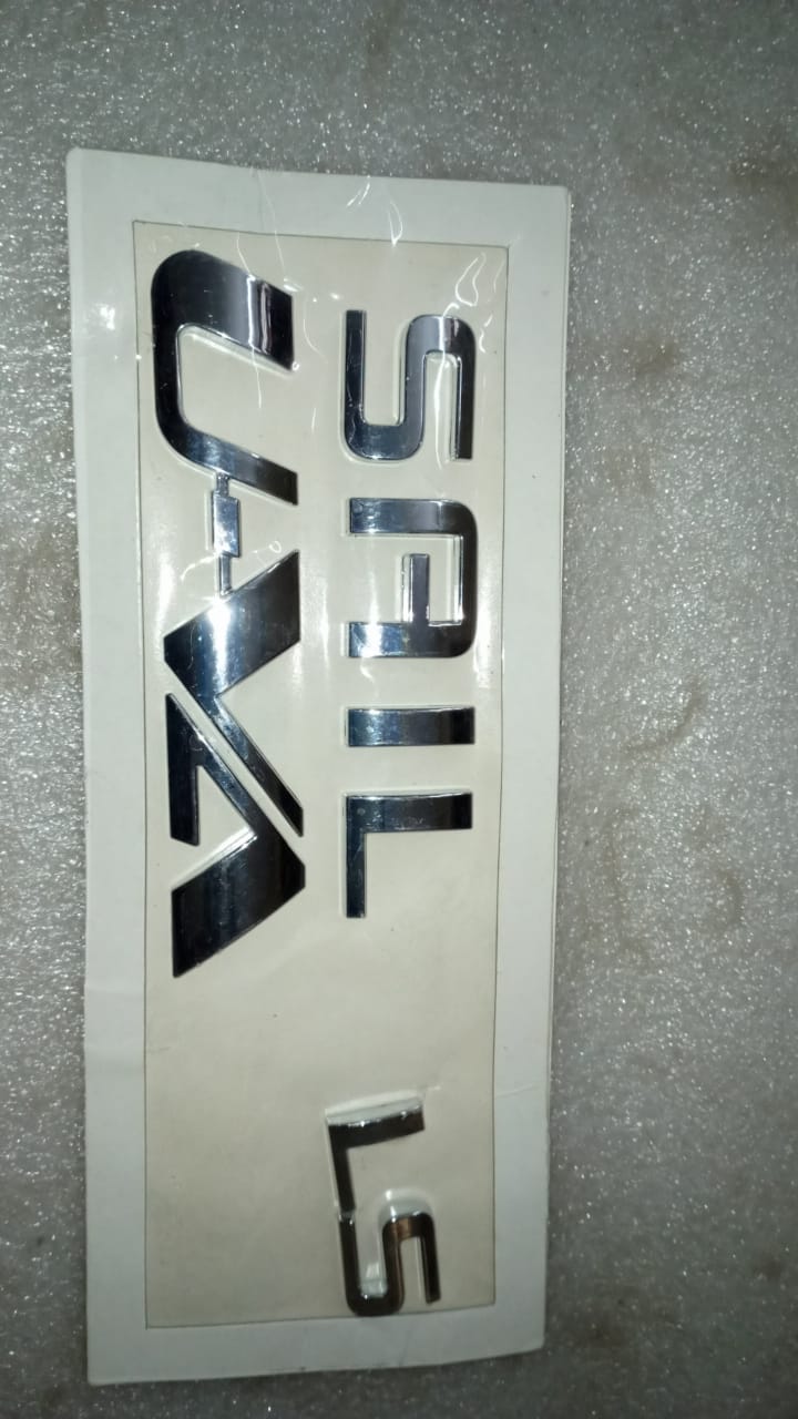 CarTrends J90905093 Name Plate Sail Uva LS spare part for vehicle, shown on a white background.