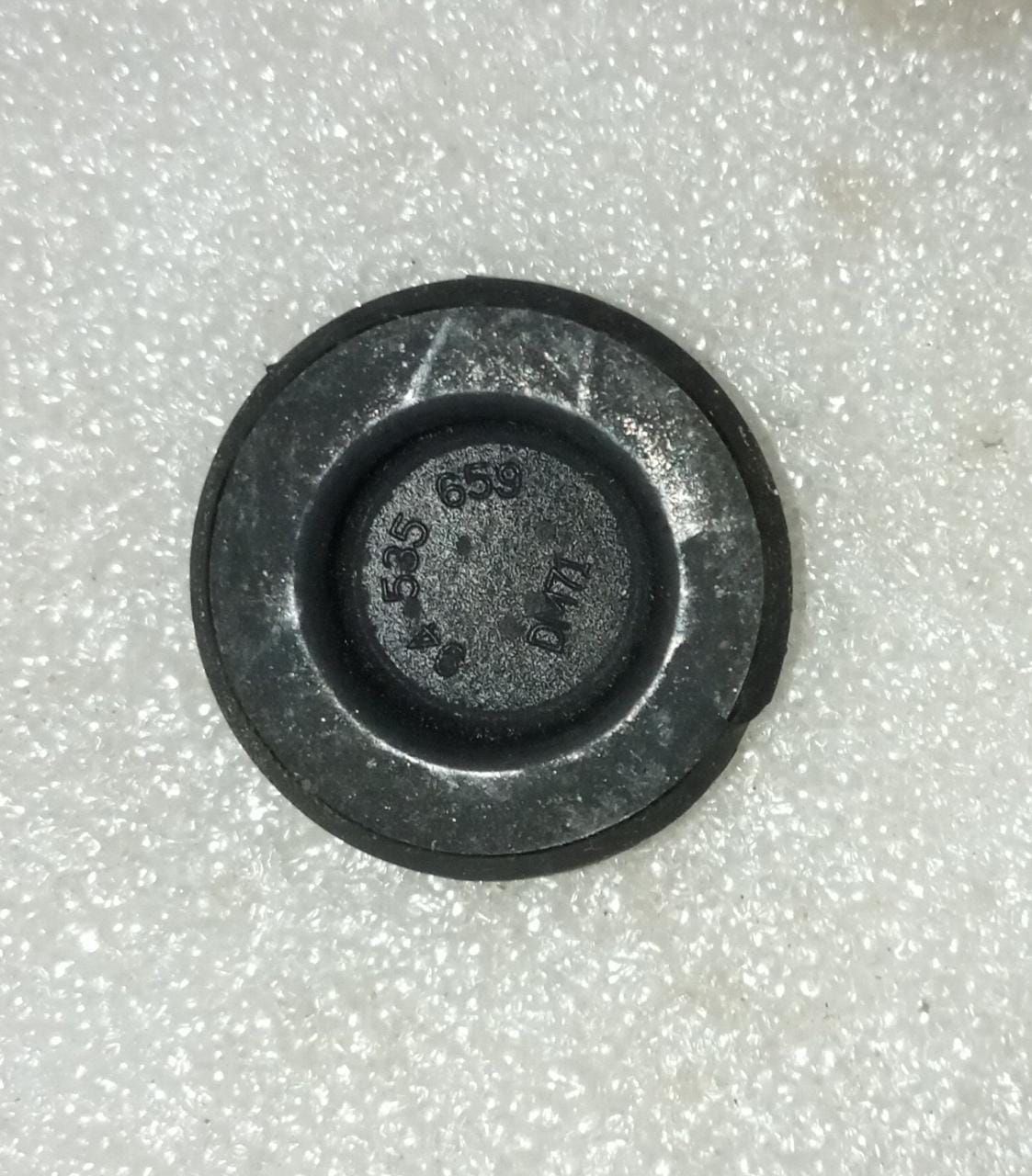 CarTrends J94535659 Plug Hole spare part for Optra vehicle, showing the plastic plug with a tapered design for sealing holes.