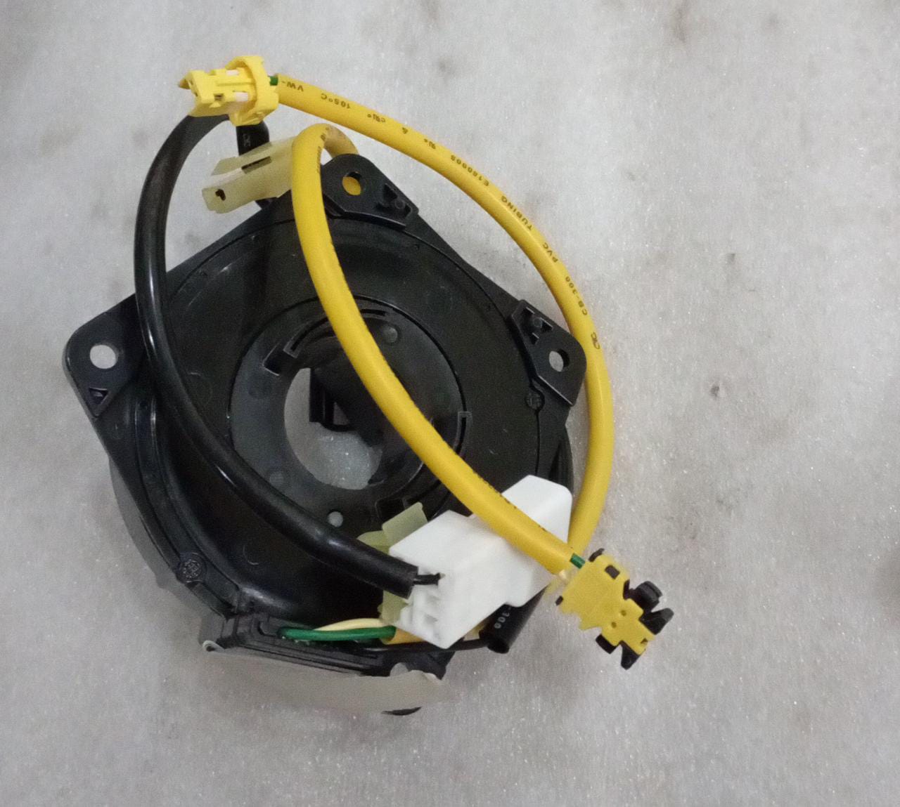 CarTrends J95486111 clock spring for Aveo, automotive spare part showing the circular mechanical component.