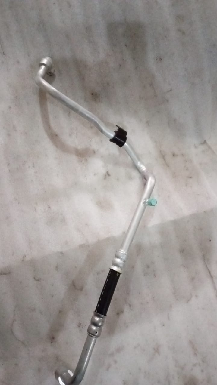 CarTrends AC evaporator hose for Captiva, automotive spare part showing flexible rubber hose with metal fittings.