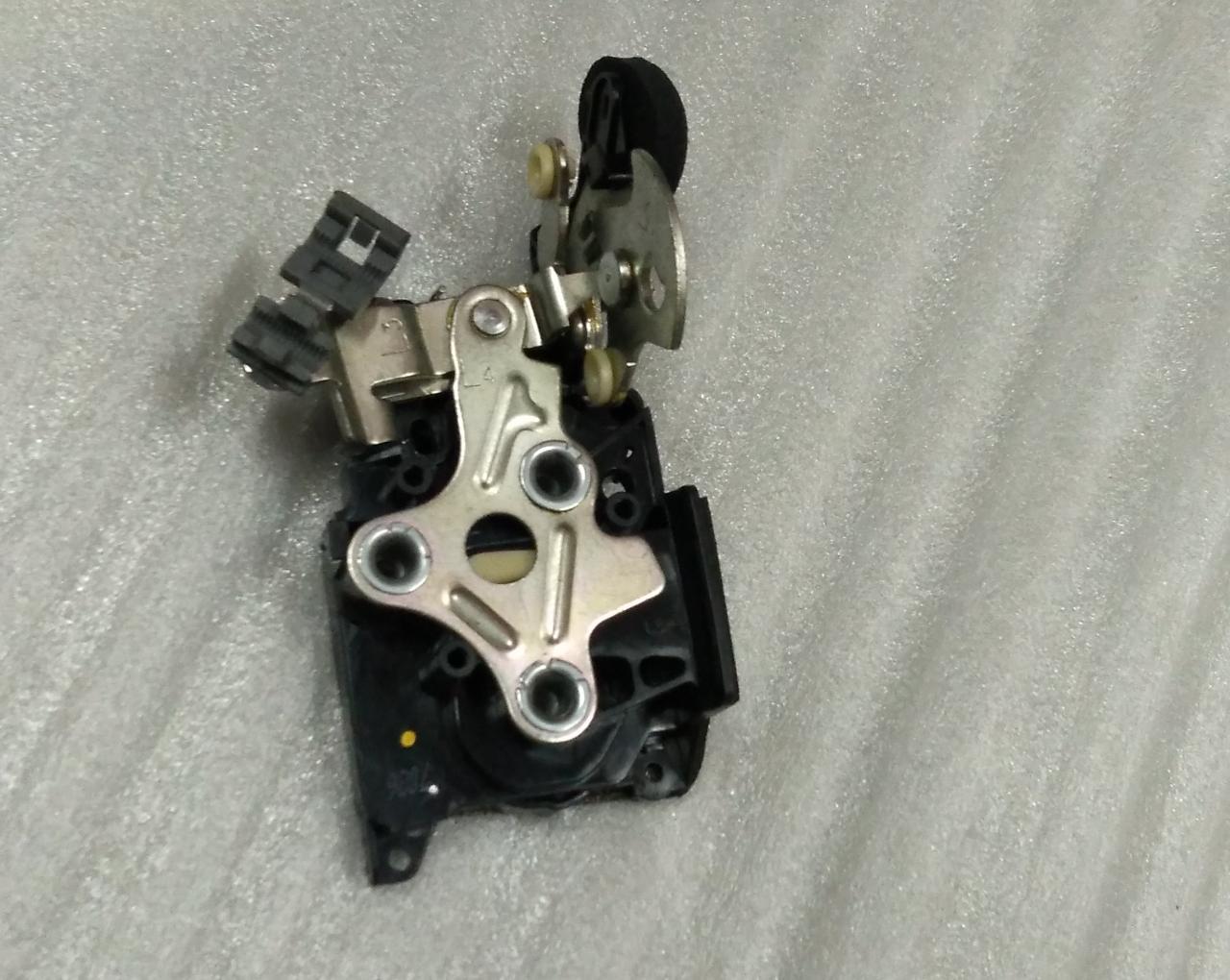 CarTrends rear left door latch beat for vehicle, spare parts component with visible latch mechanism and mounting points.
