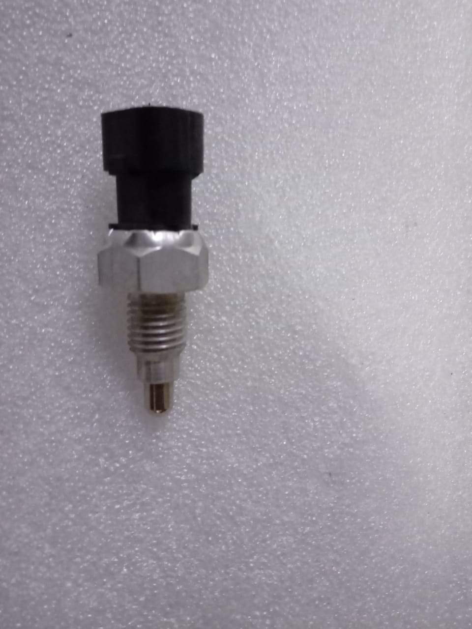 CarTrends Chevrolet Optra back-up light switch for petrol models, spare automotive part with electrical switch component.