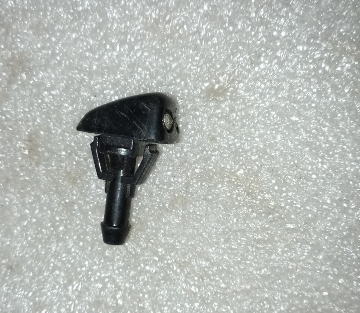 CarTrends windshield washer nozzle for Aveo, spare car parts, showing the black plastic nozzle and mounting details.