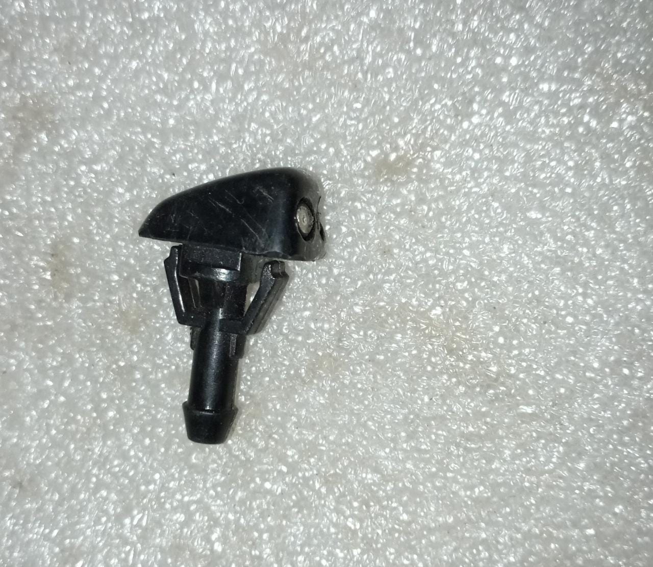 CarTrends windshield washer nozzle for Aveo, spare car parts, showing the black plastic nozzle and mounting details.