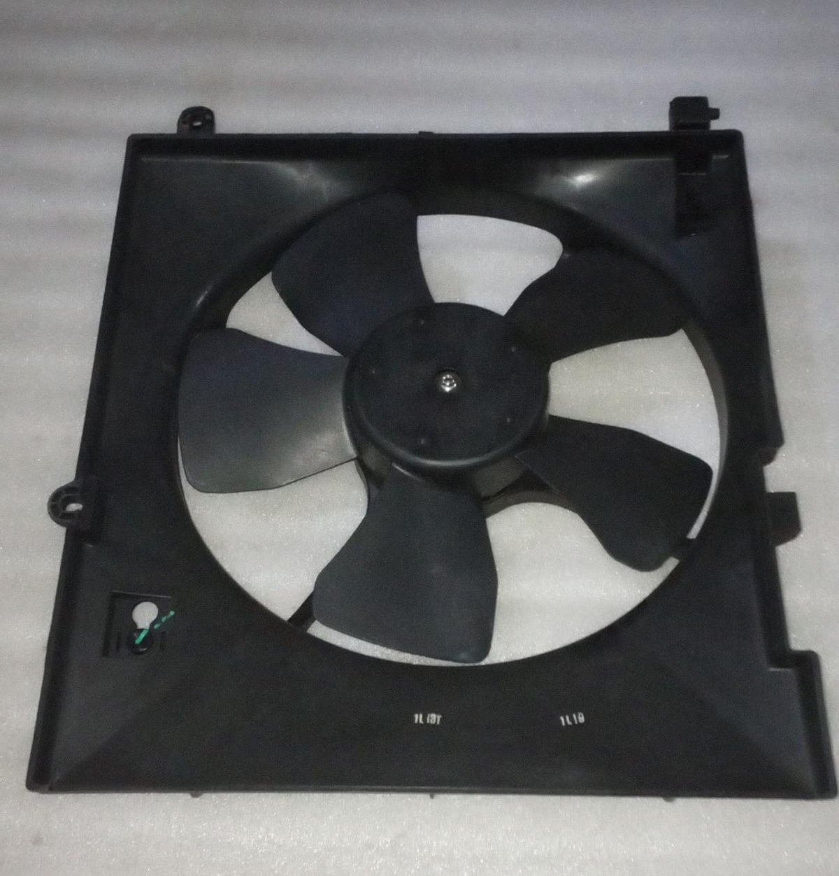 CarTrends fan assembly for Aveo radiator, automotive spare part showing the fan and mounting components.
