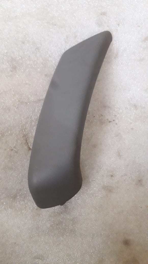 CarTrends Optra front left handle grip spare part, close-up view showing textured surface and mounting features.