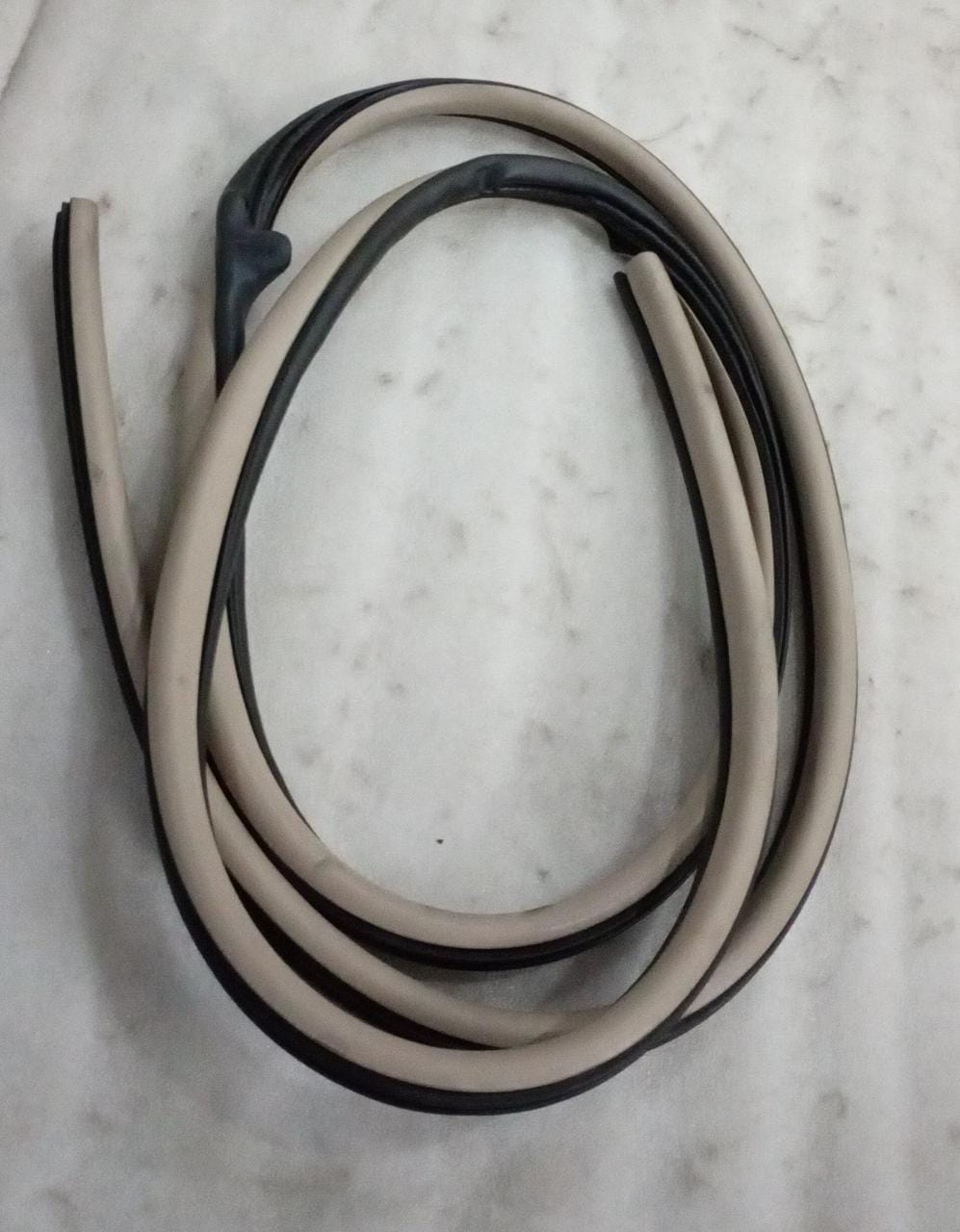 CarTrends door gola cap for Captiva, front right upper side, close-up of the spare part showing its shape and mounting area.