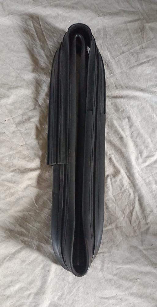 CarTrends Run channel for Aveo front left, automobile spare part with detailed metal and rubber components visible.