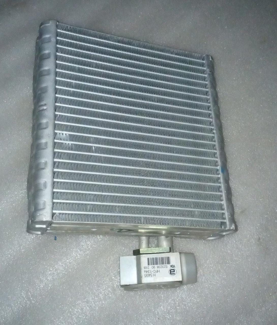 CarTrends cooling coil for Aveo, auto spare part with detailed metal coil design, used in vehicle cooling systems.
