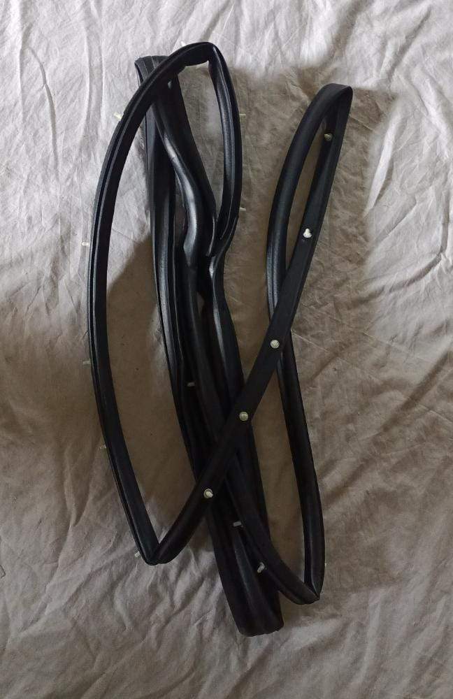 CarTrends J990061L0 Weatherstrip Spark front left door spare part showing the rubber seal for vehicle door.