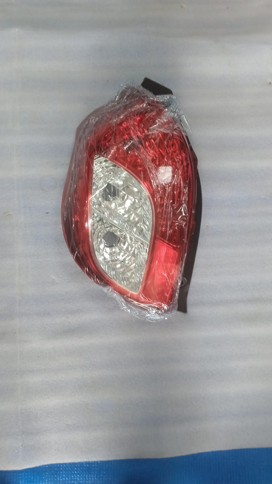 CarTrends tail lamp for Alto 800 LH spare part, showing the rear left side lamp unit with clear lens and mounting details.
