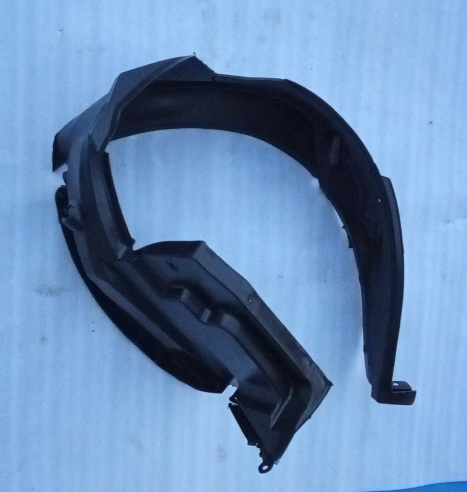 CarTrends spare part, right front fender lining for vehicle, close-up view of the automotive fender component.