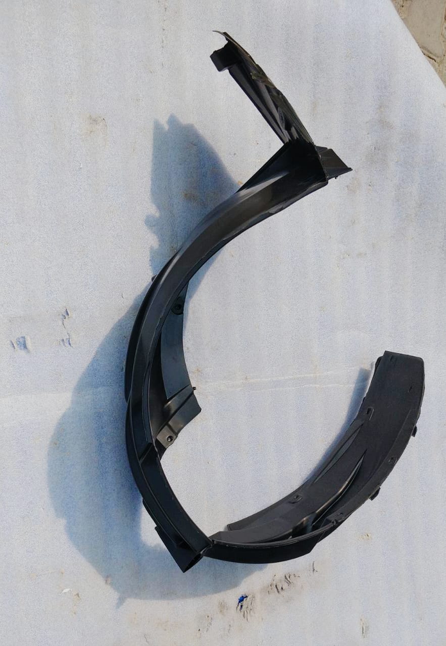 CarTrends front right fender lining for vehicle, close-up view showing durable plastic material and mounting points.