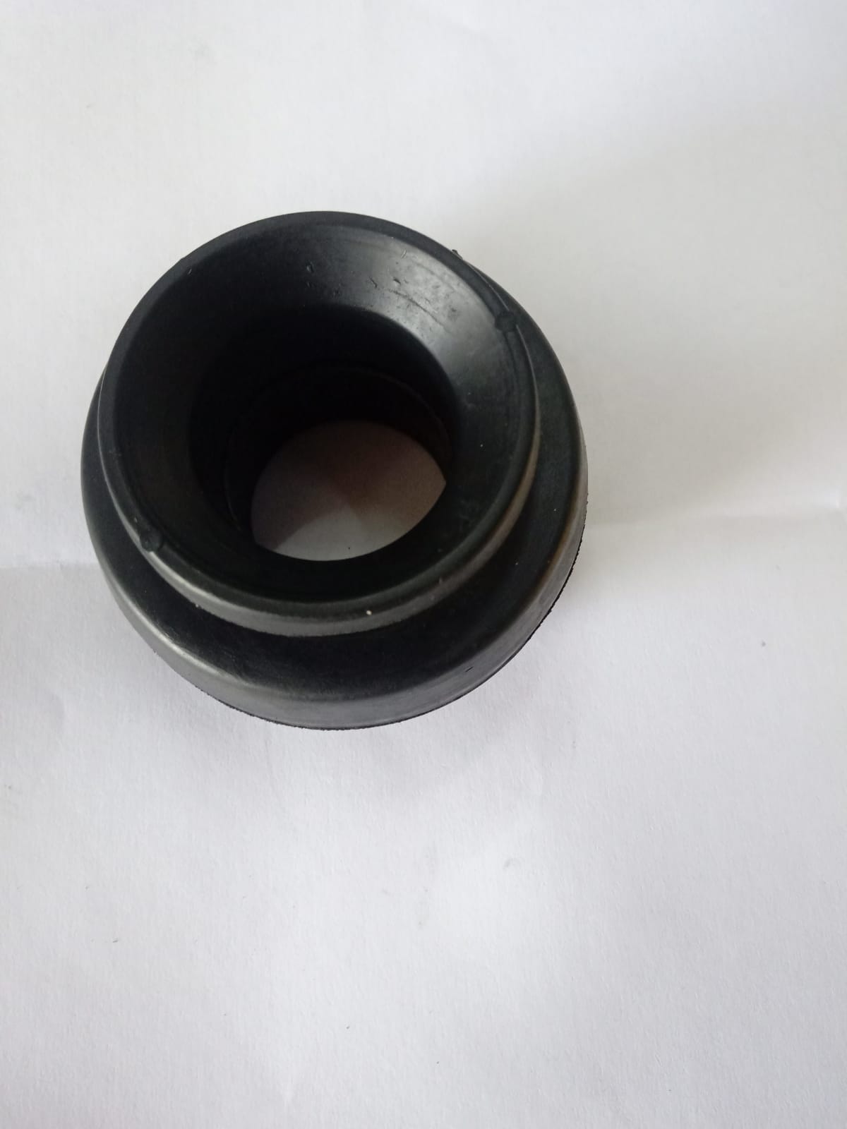 CarTrends shocker mount for Maruti Suzuki Wagon R, spare part replacement, shown in a close-up view of the shock absorber mounting point.
