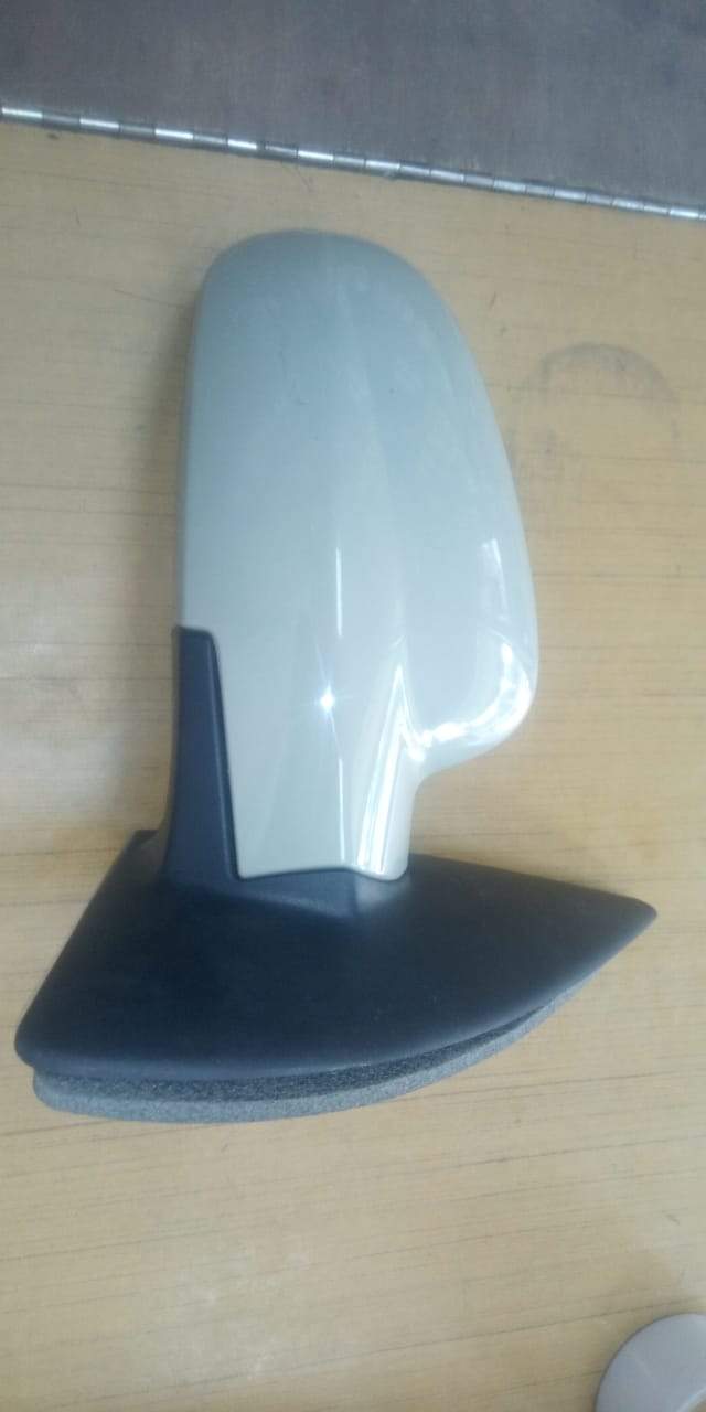 Right body-colored mirror for Uva vehicle, CarTrends spare part, showing the mirror assembly with a smooth finish.