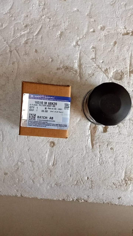 CarTrends oil filter for Suzuki, model #16510M68K20, showing the spare part designed for petrol engine maintenance.