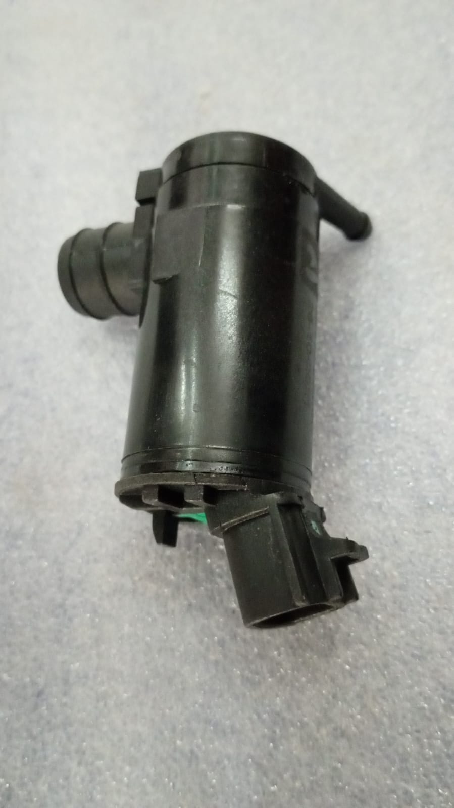 CarTrends spare parts Pump Assembly for front washer, model 38410M65M00, showing the detailed washer pump component.