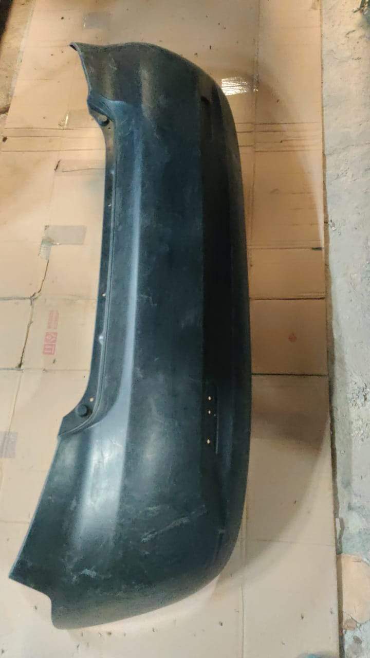 CarTrends Chevrolet Aveo rear fascia bumper spare part, close-up view showing the black plastic bumper component.