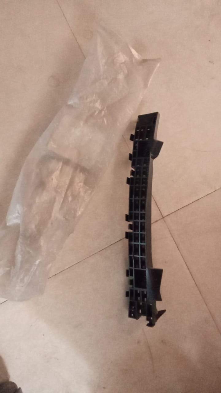 CarTrends rear bumper bracket right side for Honda Jazz, close-up of the spare part with mounting details.
