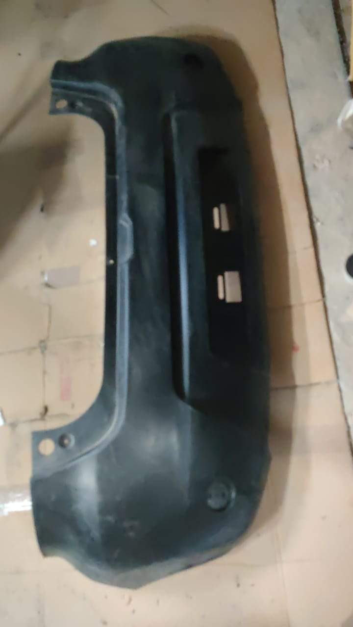 Datsun Redi Go rear fascia bumper spare part by CarTrends, showing the black rear bumper with mounting details.