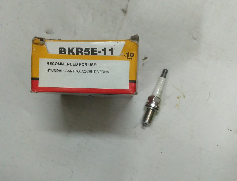 CarTrends spark plug BKR5E11 for Hyundai Santro and Accent, close-up of the durable automotive spare part.