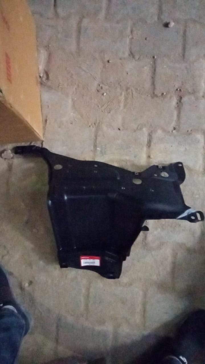 Left splash guard for Honda Jazz from CarTrends, spare part model 7416AT6EK00, designed to protect the wheel area.